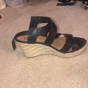 Black strappy wedge heels